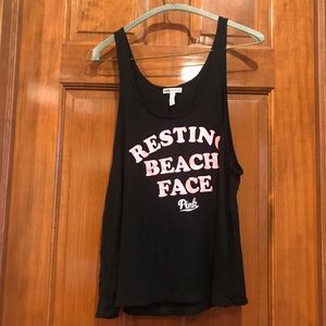 Pink resting beach face tank